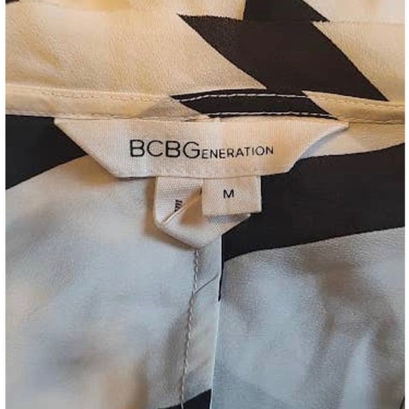 BCBGeneration
Black and White
Striped Tank
Medium - Picture 4 of 5